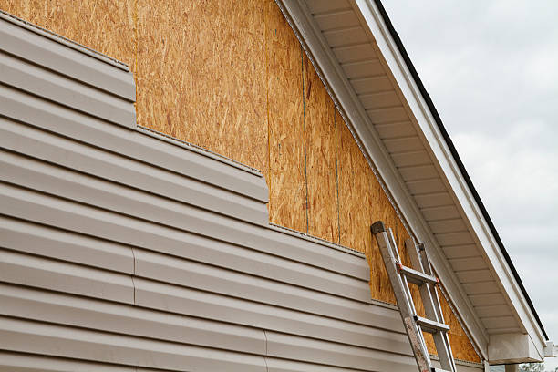 Professional Emergency Siding Repair technician working in Saint Louisville, OH
